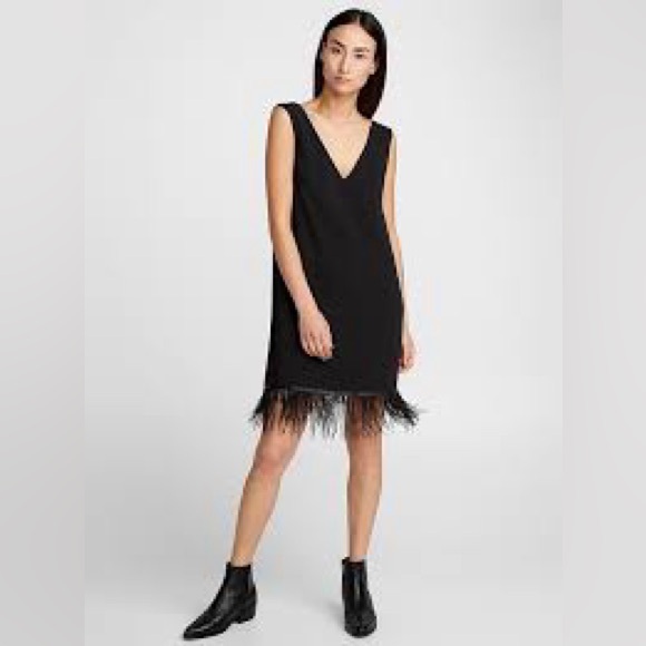 Simons Dresses & Skirts - Little Black Dress - feathered hem… Icone Size M- with Tags